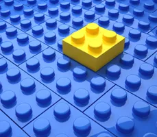 blue lego blocks with a yellow one standing out blue lego blocks with a yellow one standing out